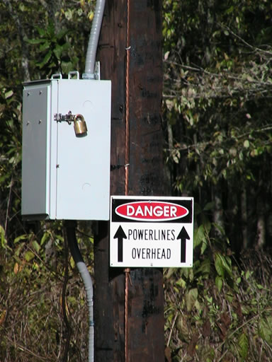 Power supply and warning sign