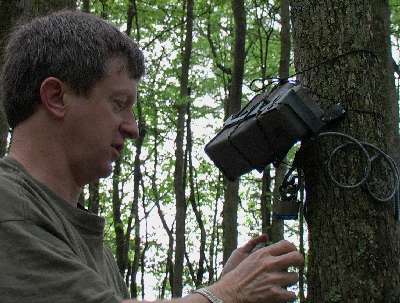 David Luneau making final adjustments to one of the remote cameras