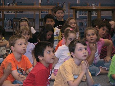 Students listening to author Terri Luneau